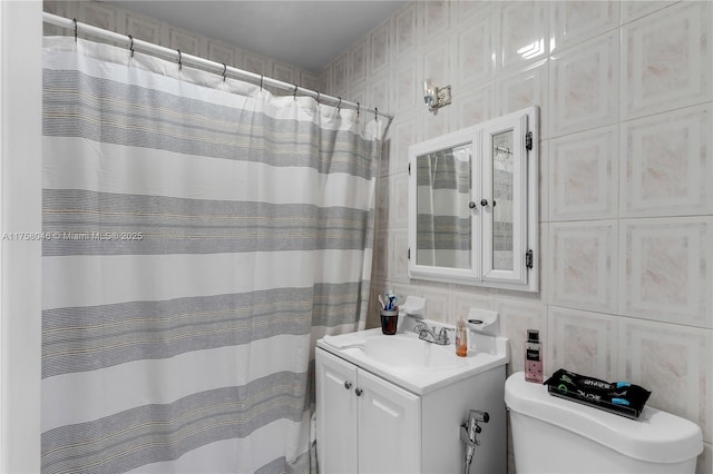 6830 SW 5th Ter, Miami, FL 33144 - full bathroom with vanity, a shower with shower curtain, tile walls, toilet, and tasteful backsplash