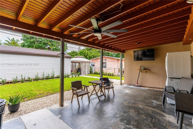 6830 SW 5th Ter, Miami, FL 33144 - view of patio / terrace with an outdoor structure and fence