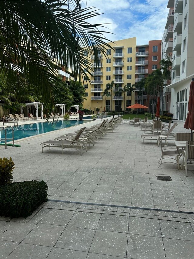 pool with a patio area