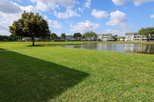 view of yard with a water view