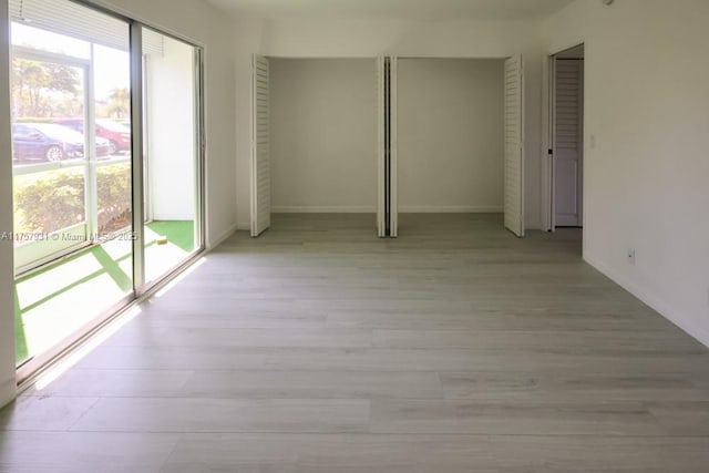 345 Preston I Unit 345, Boca Raton, FL 33434 - unfurnished room featuring light wood-type flooring and baseboards