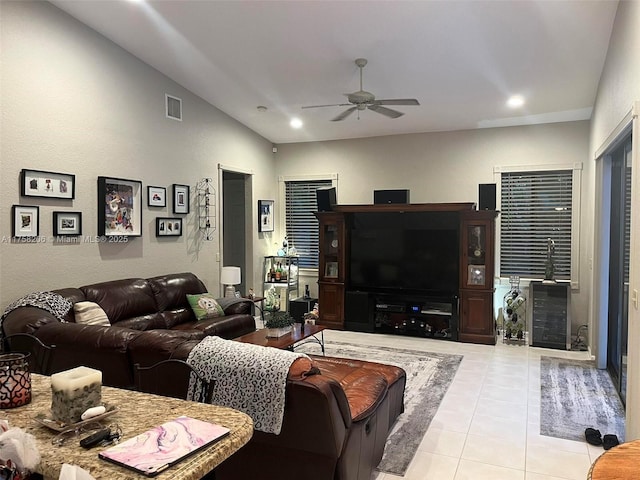 living room featuring light tile patterned floors, visible vents, a ceiling fan, and recessed lighting