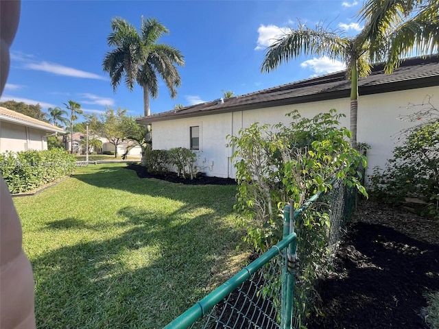 view of yard featuring fence