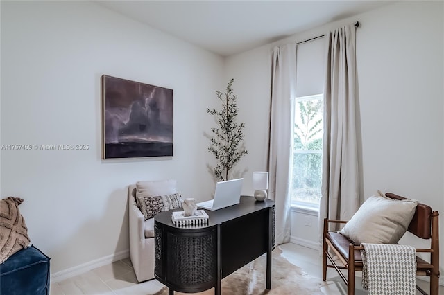 office space featuring baseboards
