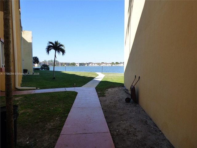 view of yard with a water view