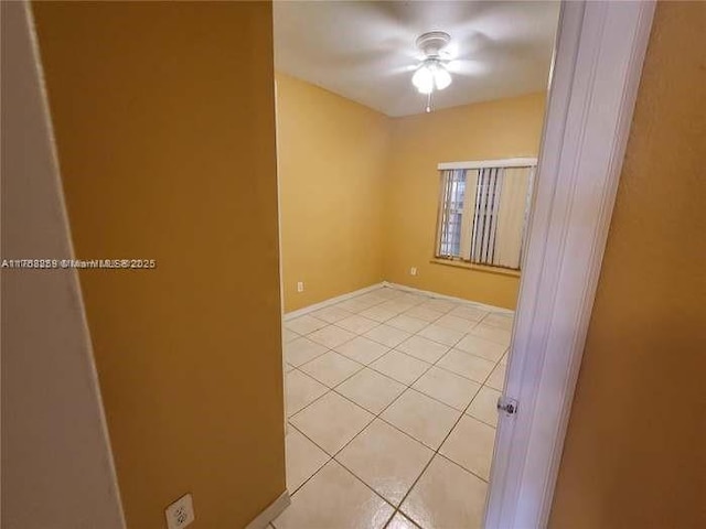 empty room featuring light tile patterned floors