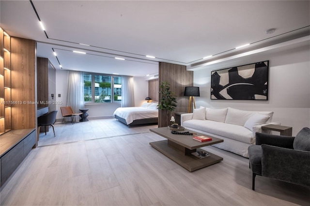 bedroom featuring light wood finished floors