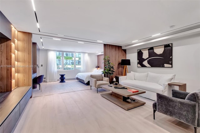 2301 Collins Ave Unit 432, Miami Beach, FL 33139 - living room featuring light wood-style flooring
