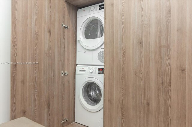 2301 Collins Ave Unit 432, Miami Beach, FL 33139 - washroom with estacked washer and dryer