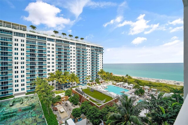 2301 Collins Ave Unit 432, Miami Beach, FL 33139 - drone / aerial view of a pool area, apartment complex / building, and a large body of water