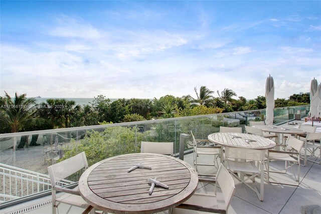 2301 Collins Ave Unit 432, Miami Beach, FL 33139 - view of patio featuring outdoor dining area