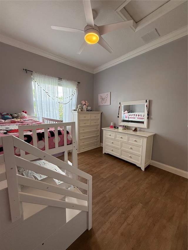 bedroom with baseboards, visible vents, a ceiling fan, dark wood-style floors, and ornamental molding