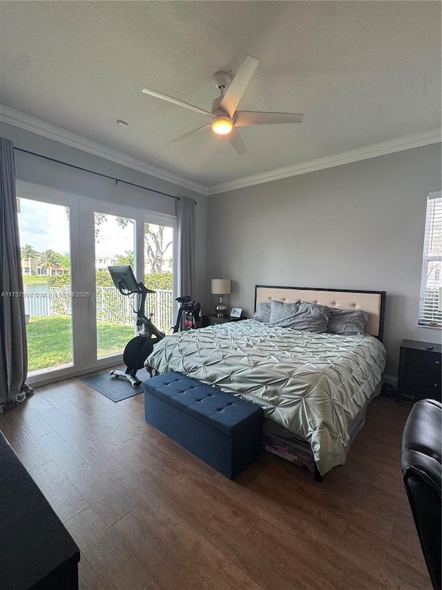 bedroom featuring access to exterior, ceiling fan, ornamental molding, and wood finished floors