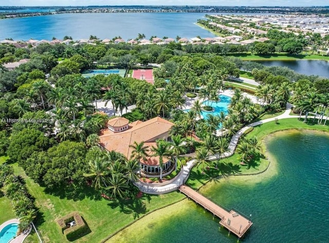 birds eye view of property with a water view