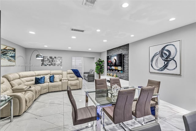 dining area featuring recessed lighting, marble finish floor, and visible vents