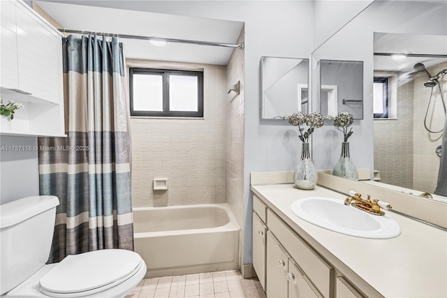 full bath featuring vanity, shower / tub combo, tile patterned flooring, and toilet