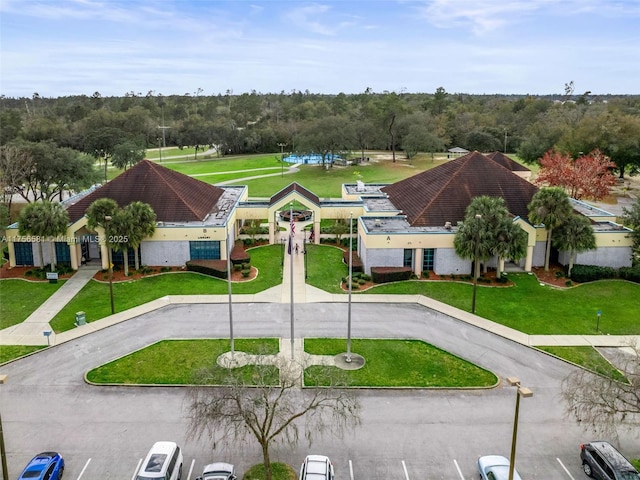 aerial view with a wooded view