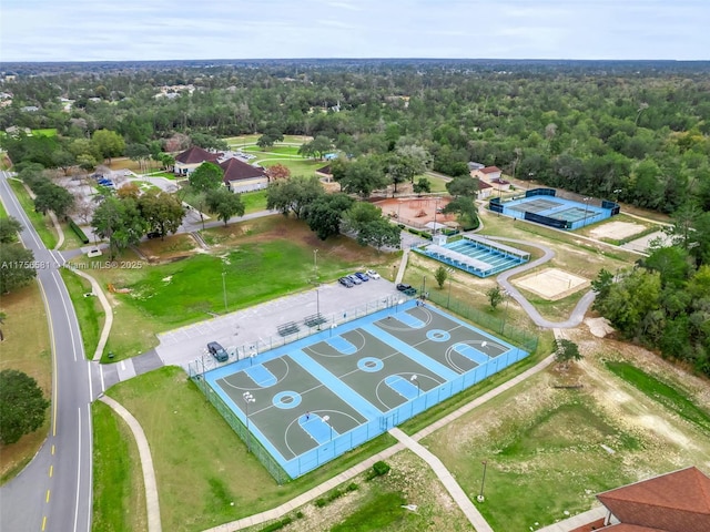 bird's eye view featuring a wooded view