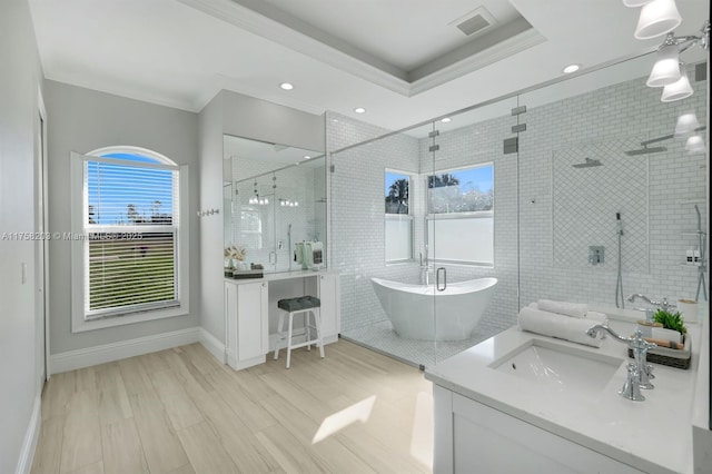 full bathroom with ornamental molding, visible vents, a shower stall, and vanity