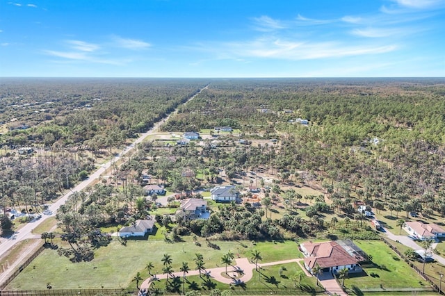 aerial view with a wooded view