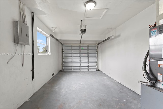 garage featuring a garage door opener, electric panel, and heating unit