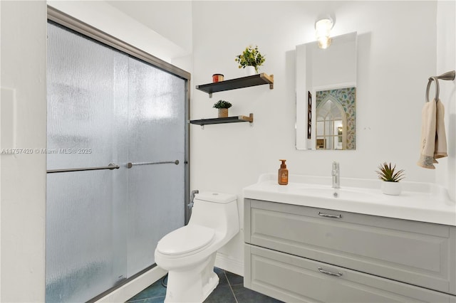 bathroom with toilet, a stall shower, tile patterned flooring, and vanity