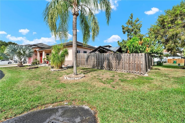 view of yard featuring fence