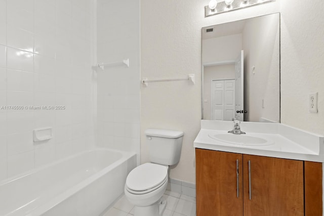 full bath with visible vents, toilet, vanity, baseboards, and tile patterned floors