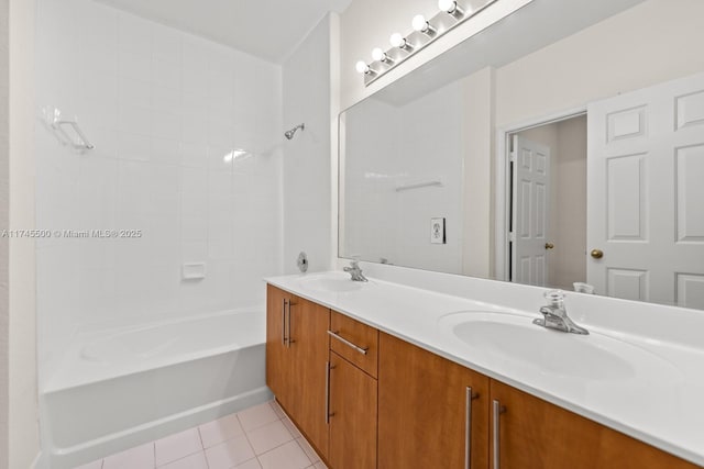 bathroom with  shower combination, double vanity, a sink, and tile patterned floors