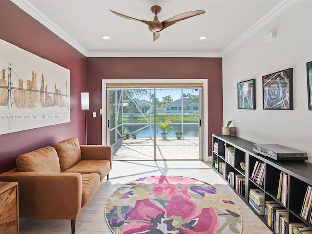 living room with a ceiling fan, recessed lighting, and crown molding