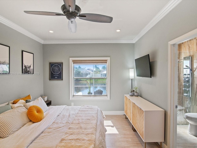 bedroom with light wood finished floors, connected bathroom, baseboards, and crown molding