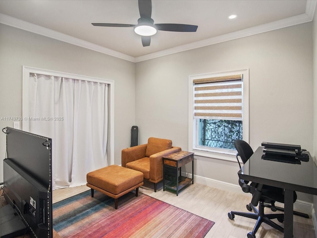 office space featuring recessed lighting, ornamental molding, a ceiling fan, wood finished floors, and baseboards