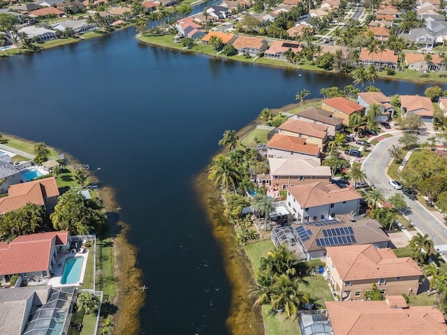 bird's eye view with a water view and a residential view