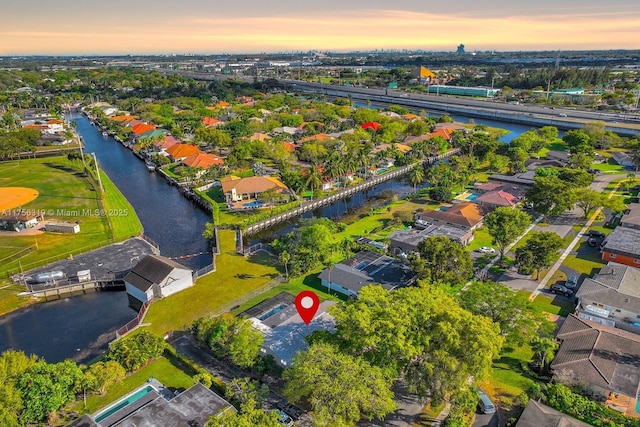 bird's eye view with a water view