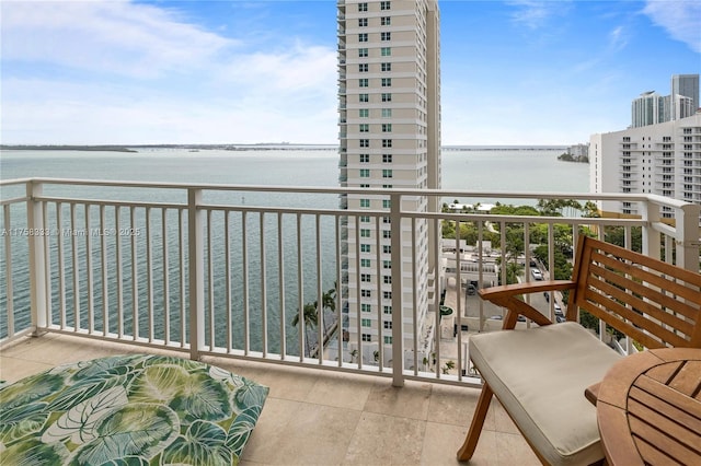 balcony featuring a water view