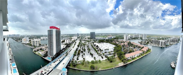 drone / aerial view with a water view and a view of city