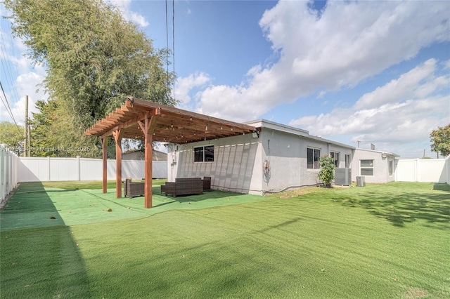 rear view of house featuring a fenced backyard, outdoor lounge area, a lawn, stucco siding, and a pergola