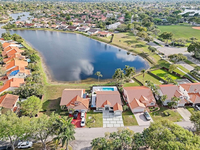 aerial view with a residential view and a water view