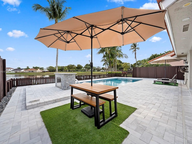 view of swimming pool featuring a patio area, a fenced in pool, and a fenced backyard