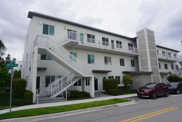 view of property with stairway