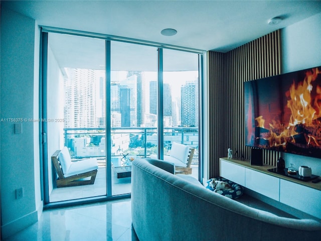 tiled living room with floor to ceiling windows