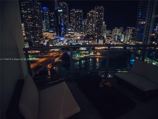 balcony at night with a view of city lights