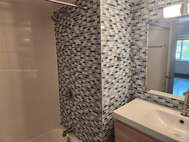 full bath featuring tasteful backsplash, shower / tub combination, and vanity