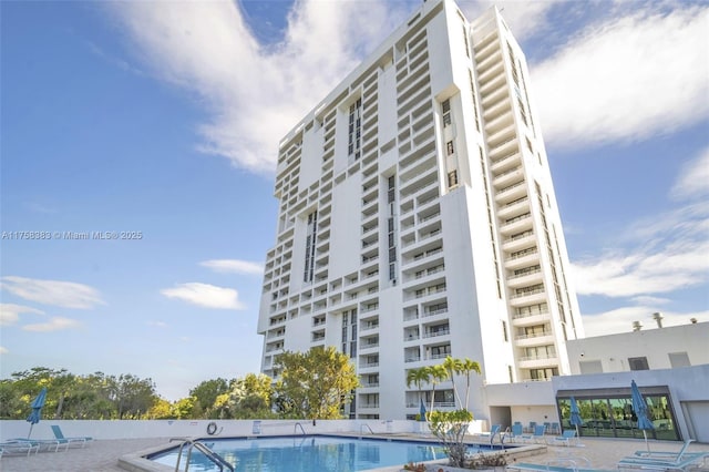 exterior space with a community pool