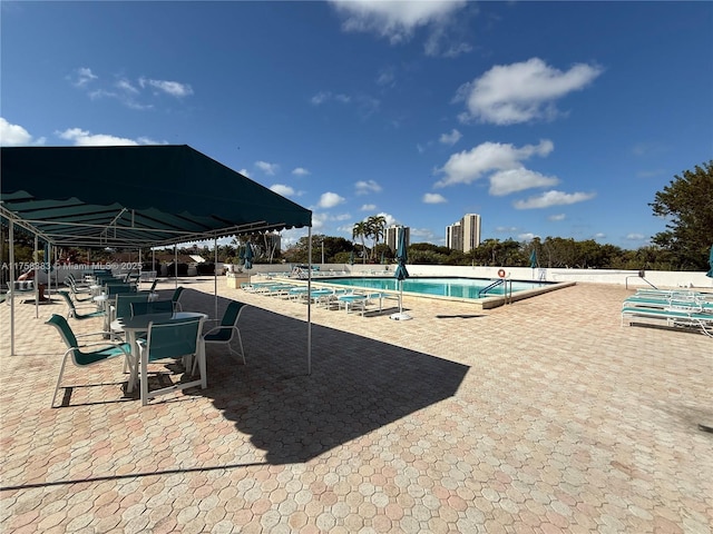 pool featuring a patio