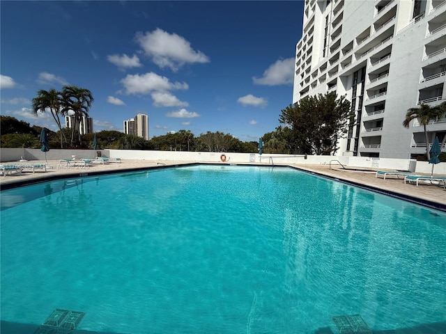 community pool featuring a patio