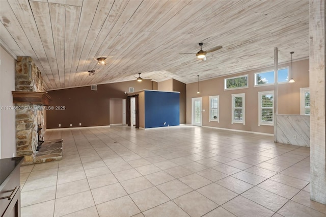 unfurnished living room featuring lofted ceiling, wood ceiling, ceiling fan, and light tile patterned floors