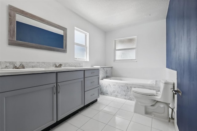 full bath with toilet, a textured ceiling, vanity, tile patterned flooring, and a bath