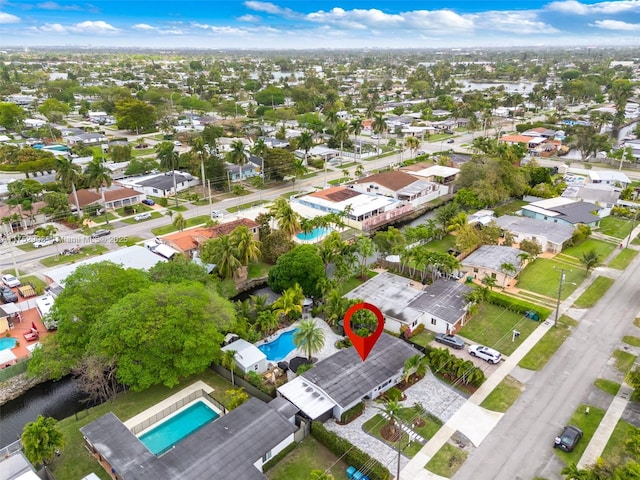 aerial view with a water view and a residential view