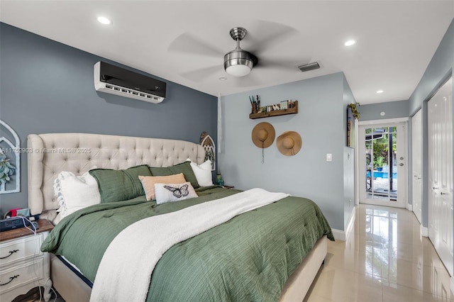 bedroom with visible vents, baseboards, a wall unit AC, ceiling fan, and access to outside